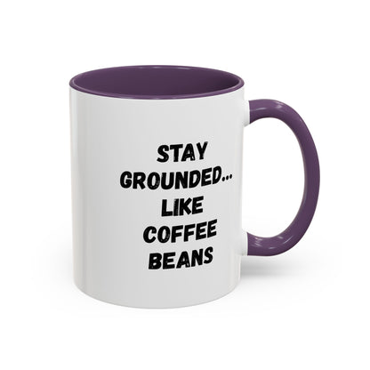 White ceramic coffee mug with "Stay Grounded Like Coffee Beans" printed in black, featuring a humorous coffee lover design.