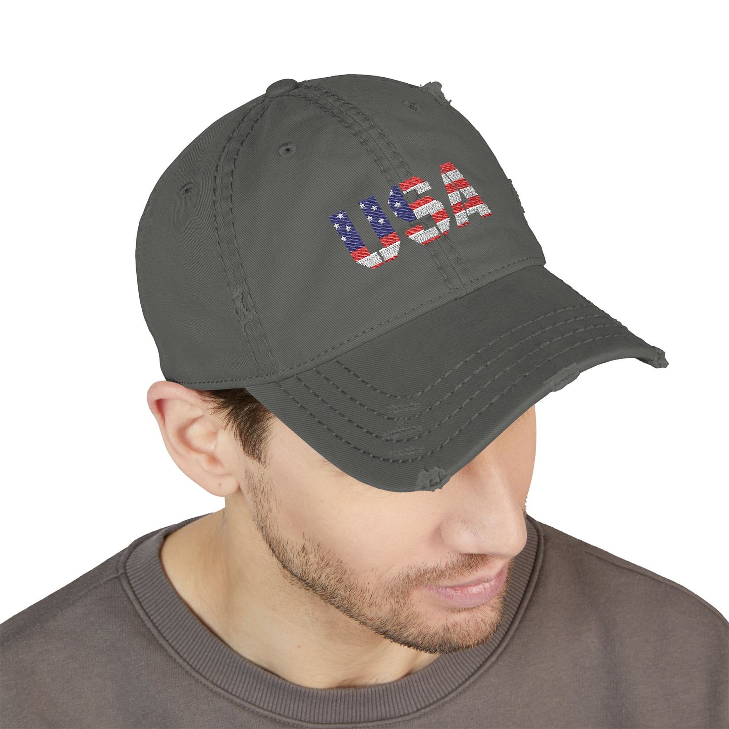 Distressed USA flag embroidered dad hat in navy blue with adjustable strap, featuring patriotic embroidered flag design.