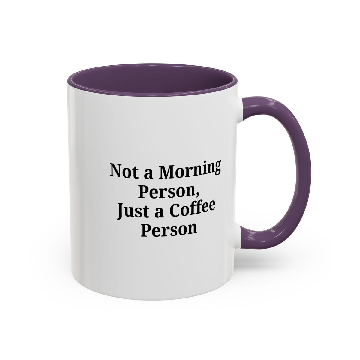 Ceramic coffee mug with "Not a Morning Person, Just a Coffee Person" printed in black text, white background, and handle.