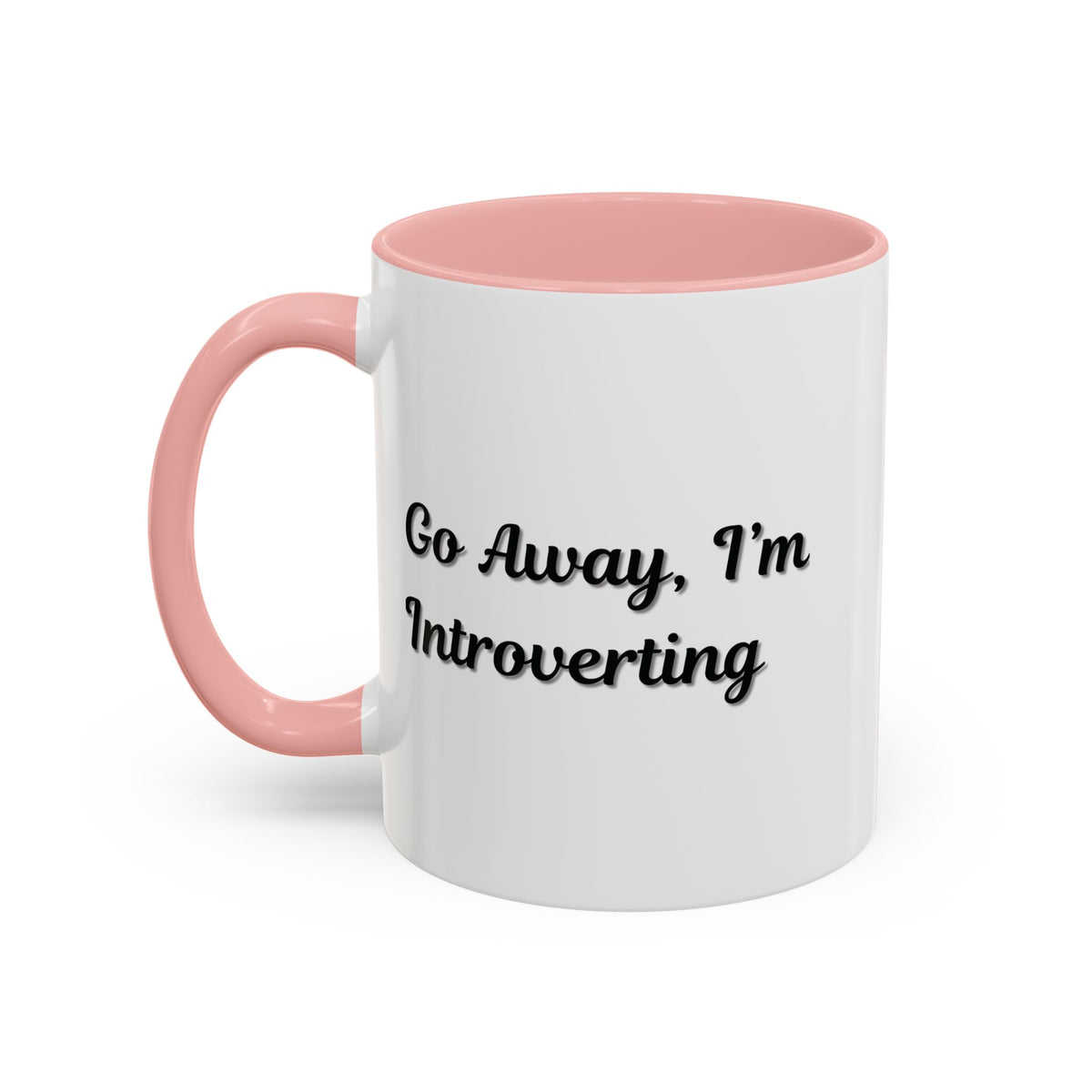 Ceramic introvert coffee mug with "Go Away, I'm Introverting" text, 11 oz size, designed for personal use or gifts.