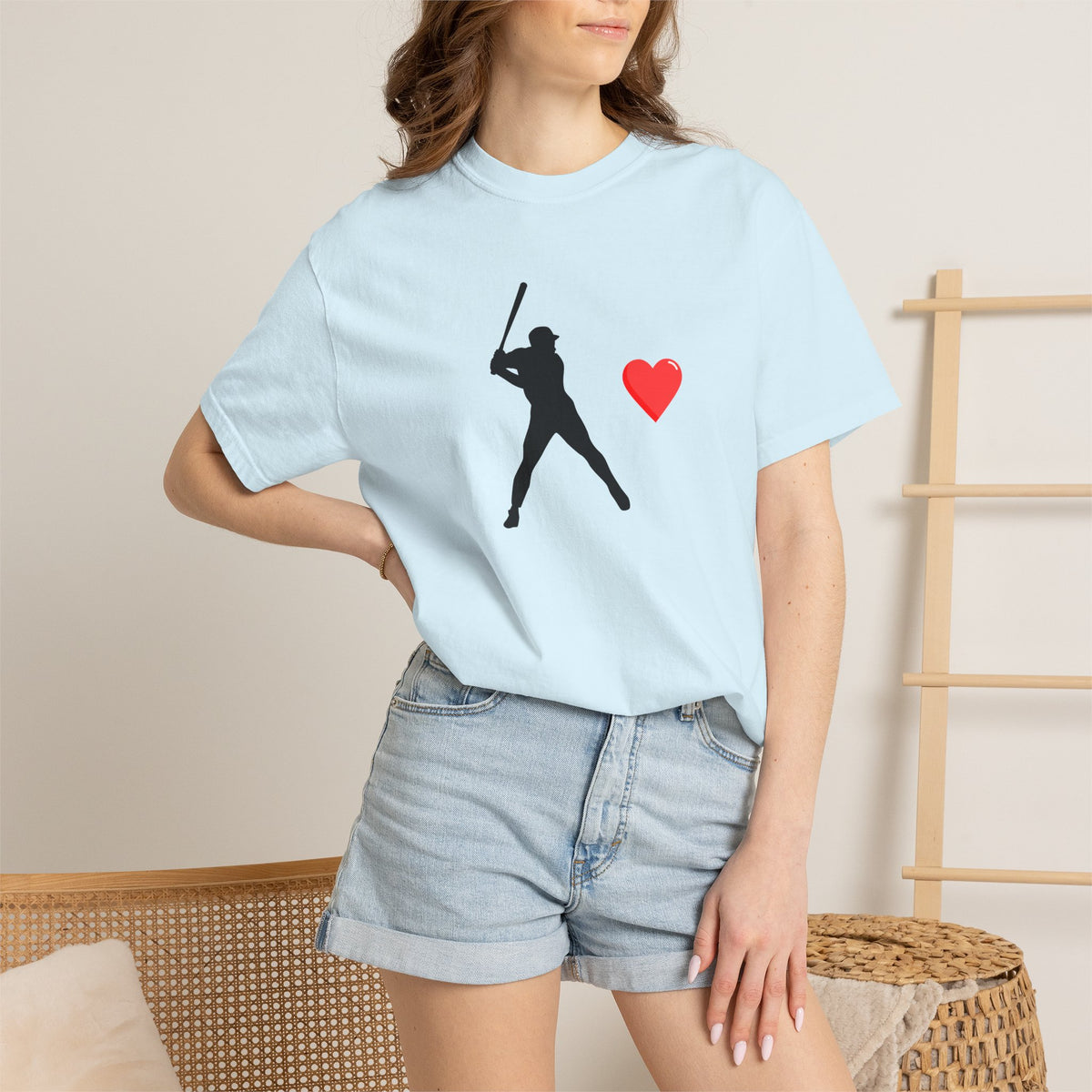 White baseball batter heart T-shirt by Printify featuring a graphic print of a batter with a heart design on the front.
