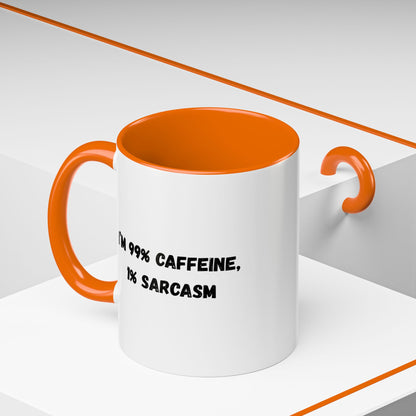 Ceramic coffee mug with "I'm 99% Caffeine, 1% Sarcasm" print, accent design, ideal for coffee lovers.