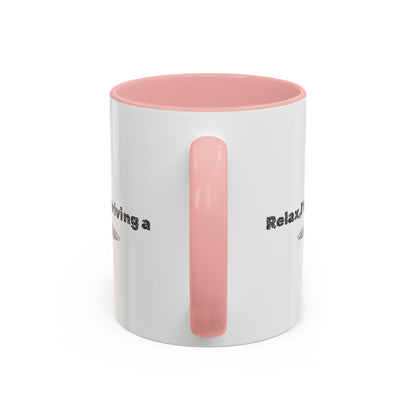 Ceramic coffee mug with "Relax, I’m Driving" UFO design, 11 oz, featuring a colorful alien and spaceship illustration.