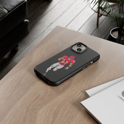 Black football player tough phone case for iPhone, protective sports design with athletic theme from Printify.