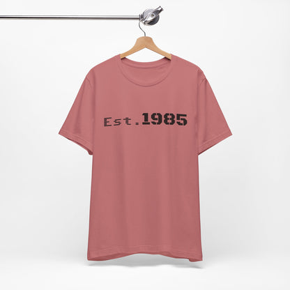 Vintage Est. 1985 graphic T-shirt by Printify featuring a retro year design on a casual cotton tee.