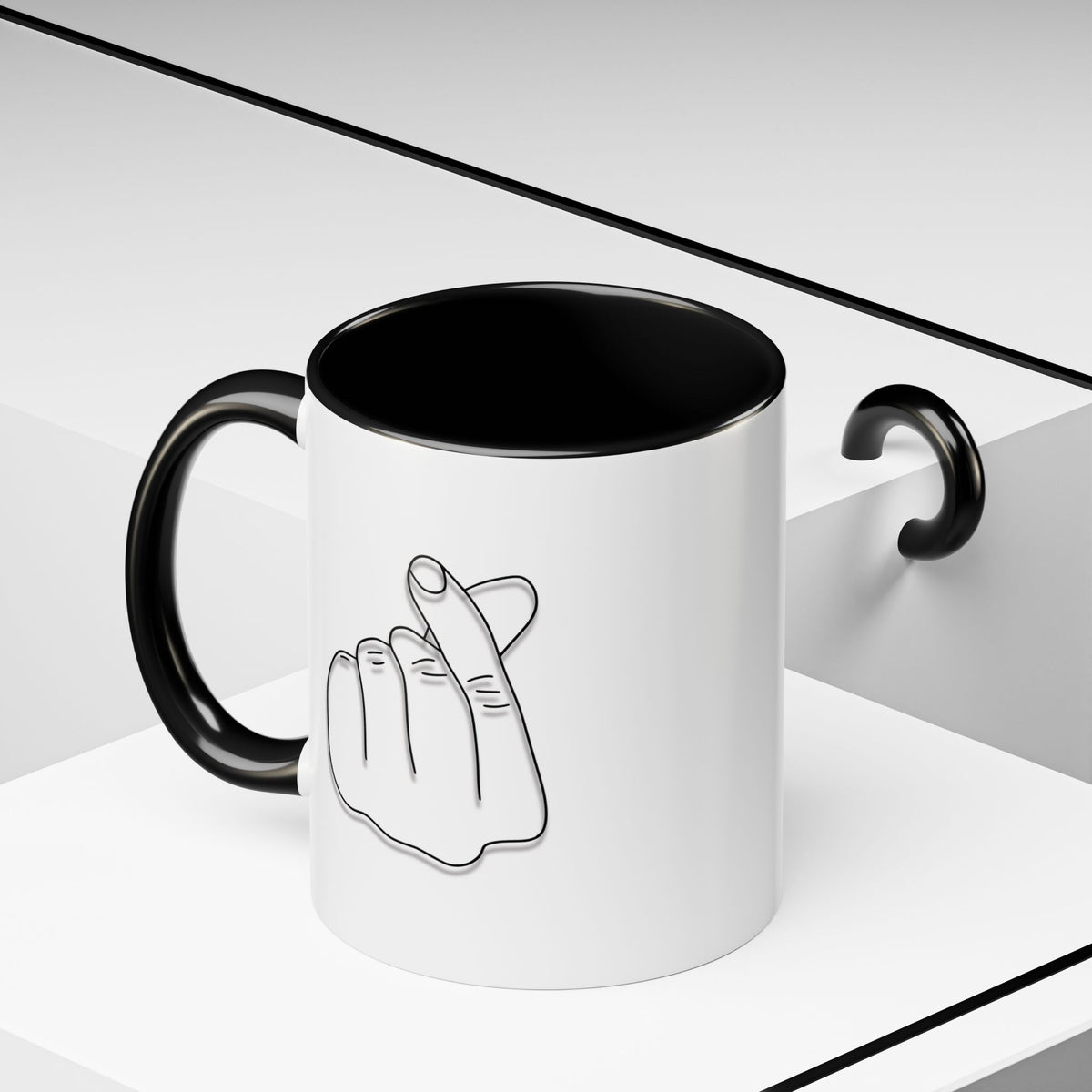 Minimal Korean finger heart accent mug by Printify, 11oz or 15oz, featuring a simple, stylish design on a ceramic coffee mug.