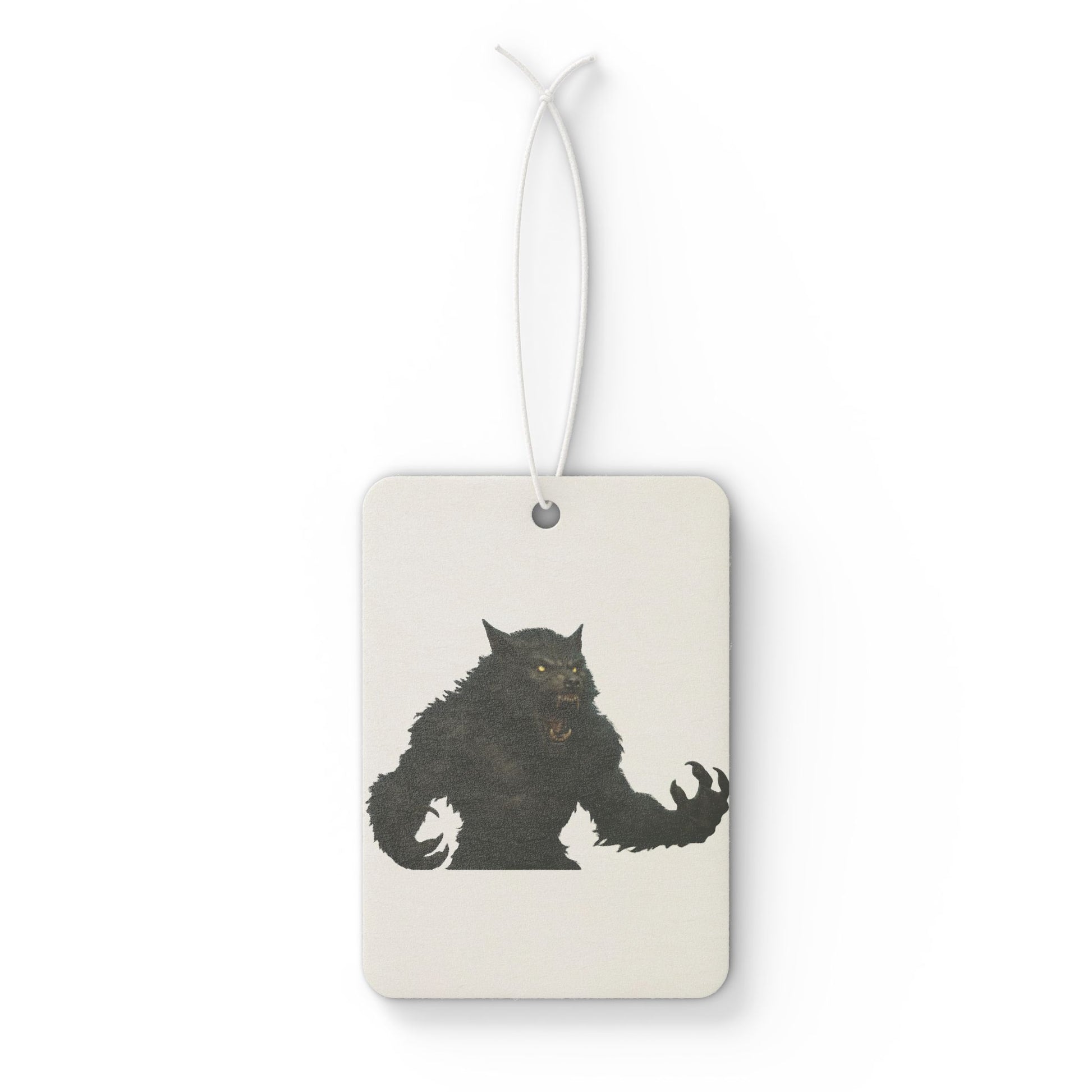 Werewolf car air freshener accessory by Printify, featuring a spooky Halloween design, hanging from a car rearview mirror.