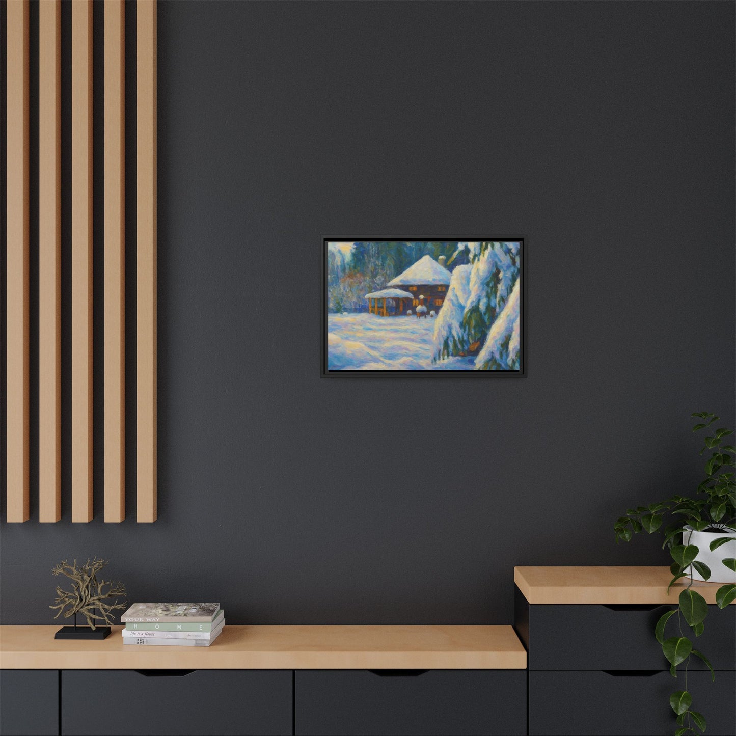 Framed matte canvas wall art of a snowy cabin winter landscape, showcasing a cozy winter scene with trees and snow.