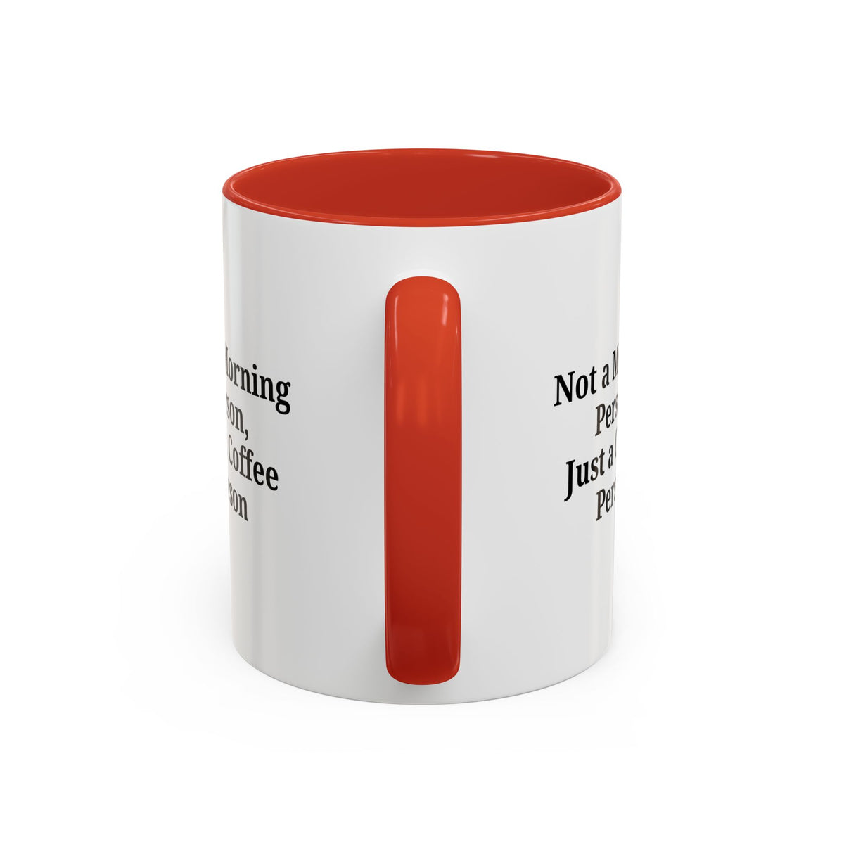 Ceramic coffee mug with "Not a Morning Person, Just a Coffee Person" text, featuring a white background and colorful lettering.