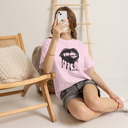 Black graphic T-shirt by Printify featuring dripping lips with a "hmm..." bite design on the front.