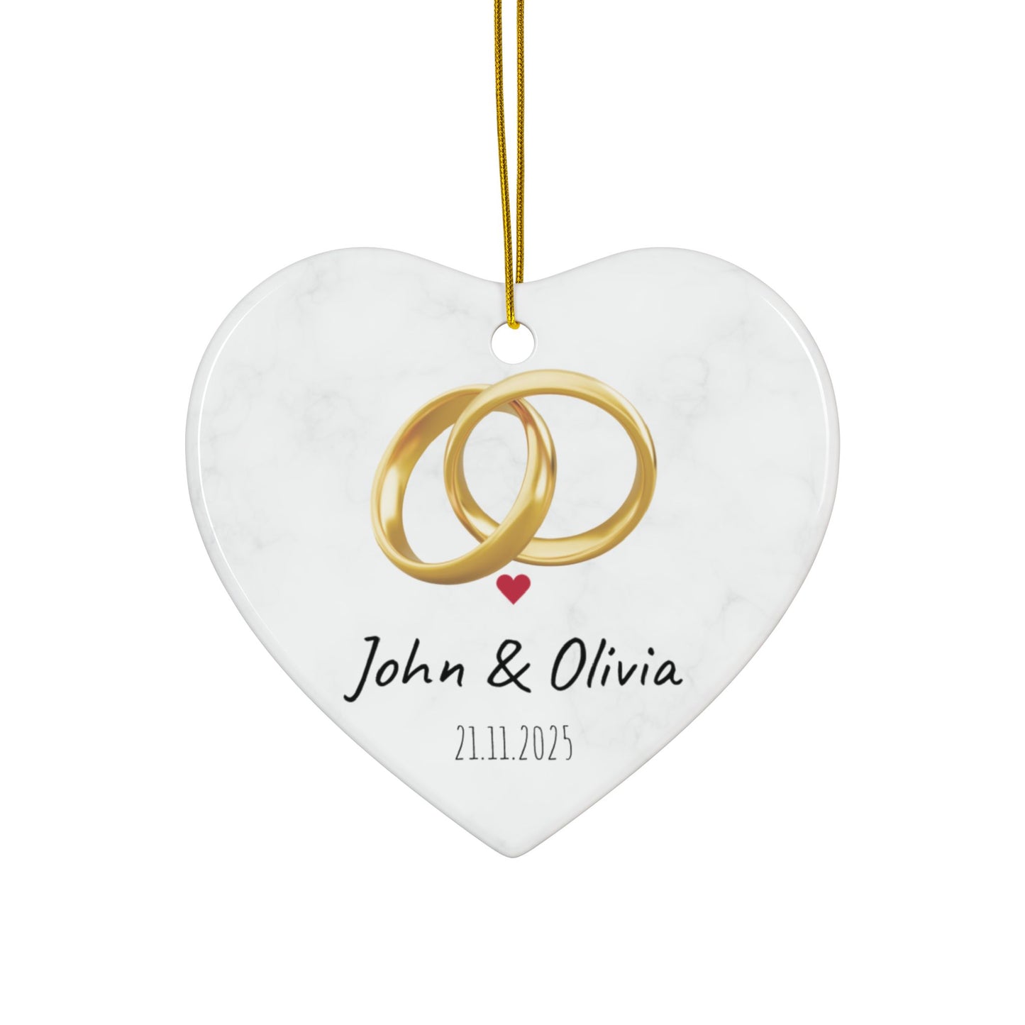 Round ceramic wedding rings ornament with personalized names and date, featuring decorative design for special occasions.