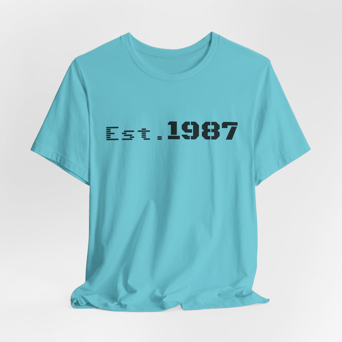 Vintage black Est. 1987 T-Shirt by Printify featuring bold "Born 1987" graphic on front, casual and stylish fit.