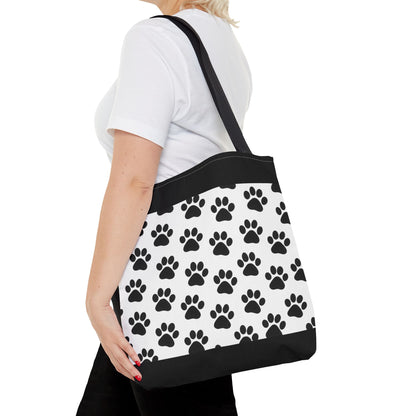 Eco-friendly paw print tote bag by Printify, featuring a stylish design, perfect for dog and cat lovers to carry essentials.