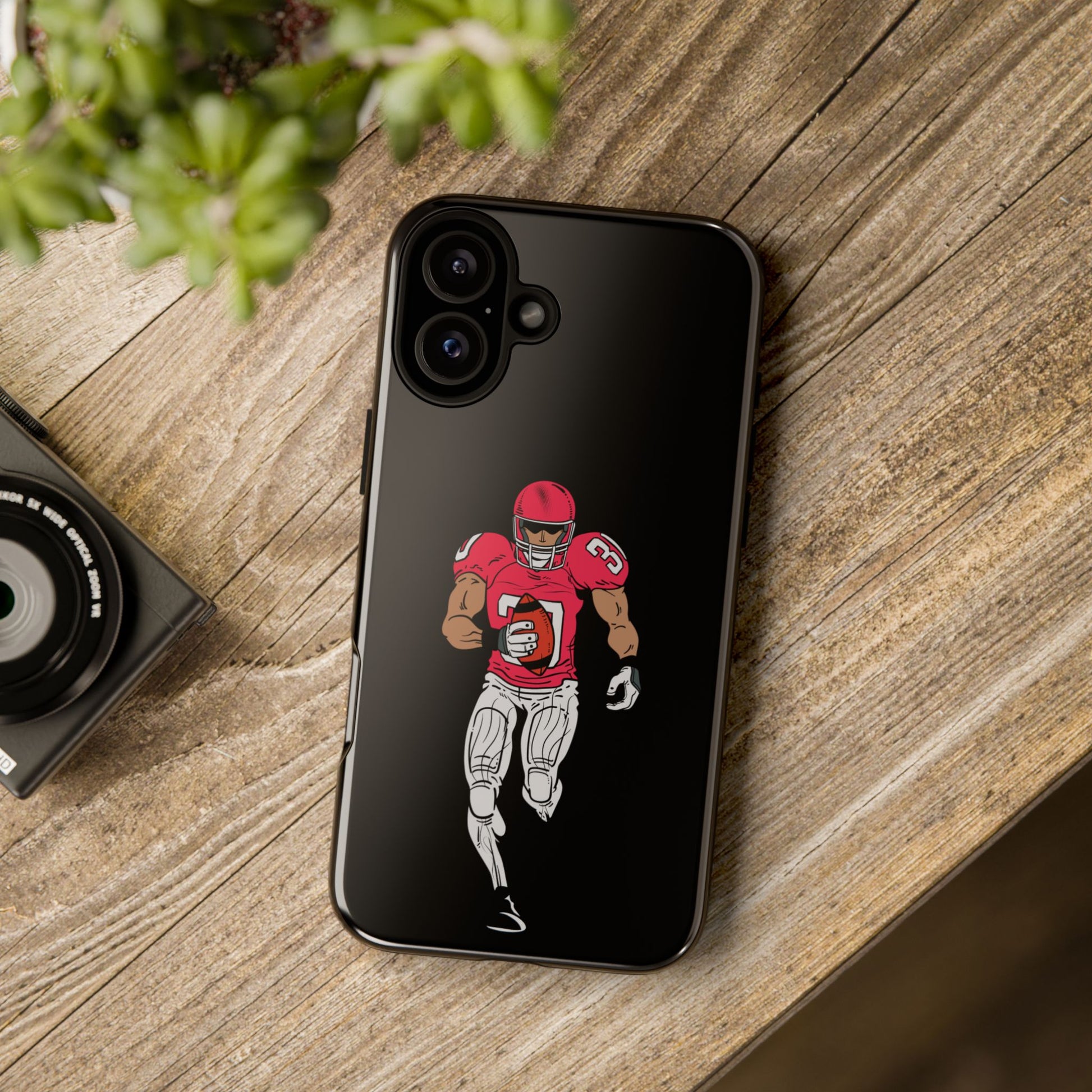 Black football player tough phone case for iPhone by Printify, featuring sports-themed design and durable protective material.