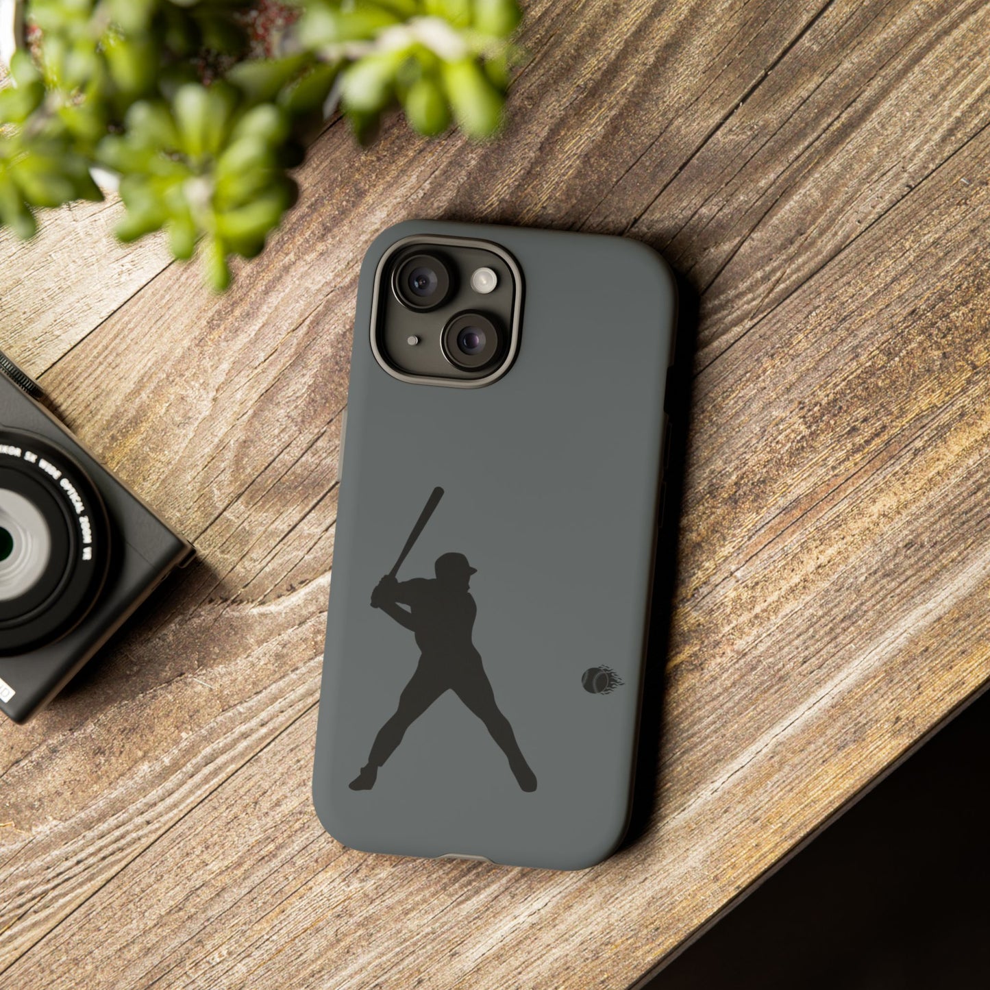 Black baseball silhouette tough phone case for iPhone, protective sporty design by Printify with durable material.