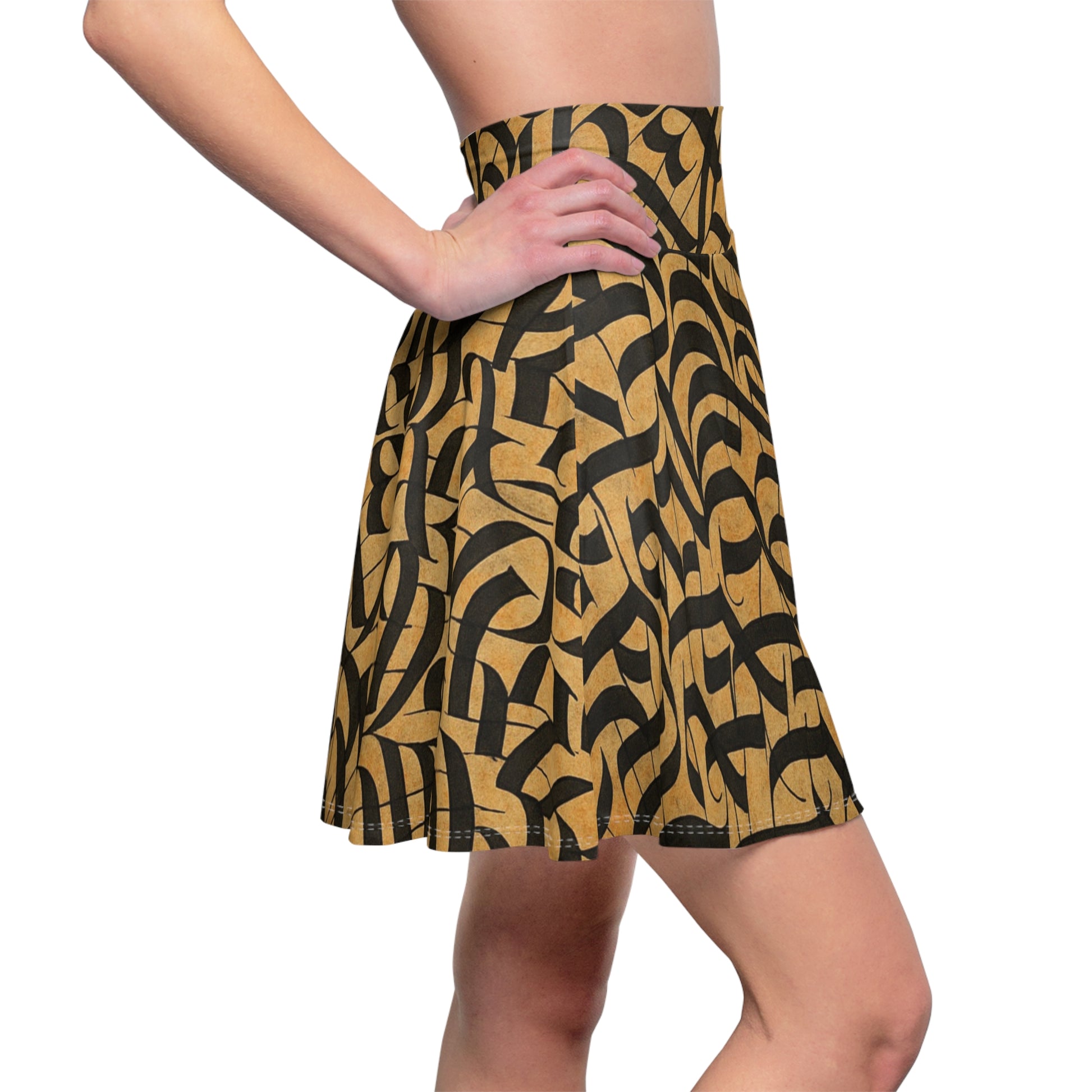 Gold and black calligraphy print skater skirt with boho festival style, featuring all-over artistic design by Printify.