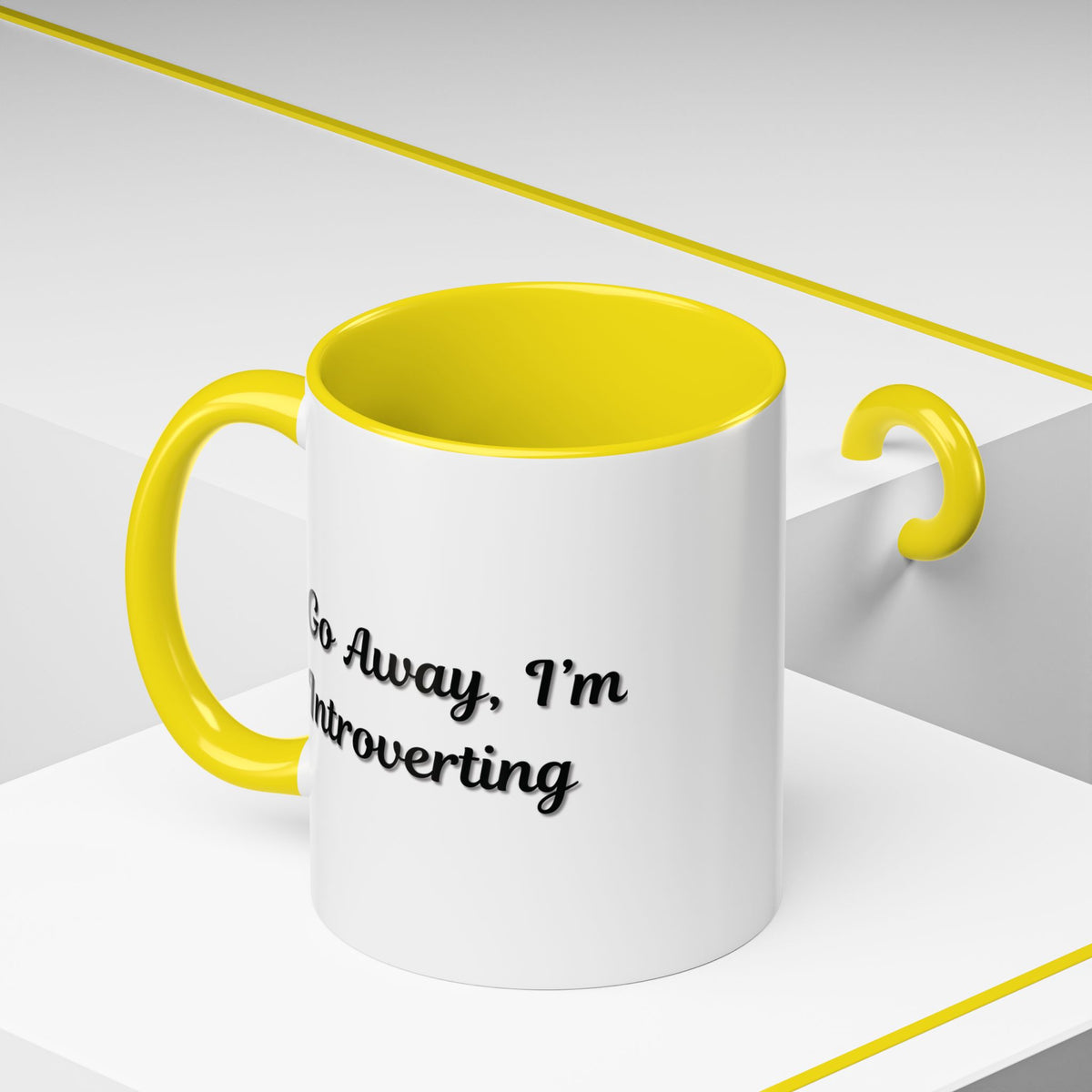 Ceramic coffee mug with "Go Away, I'm Introverting" slogan, 11 oz size, featuring a white mug with black text.