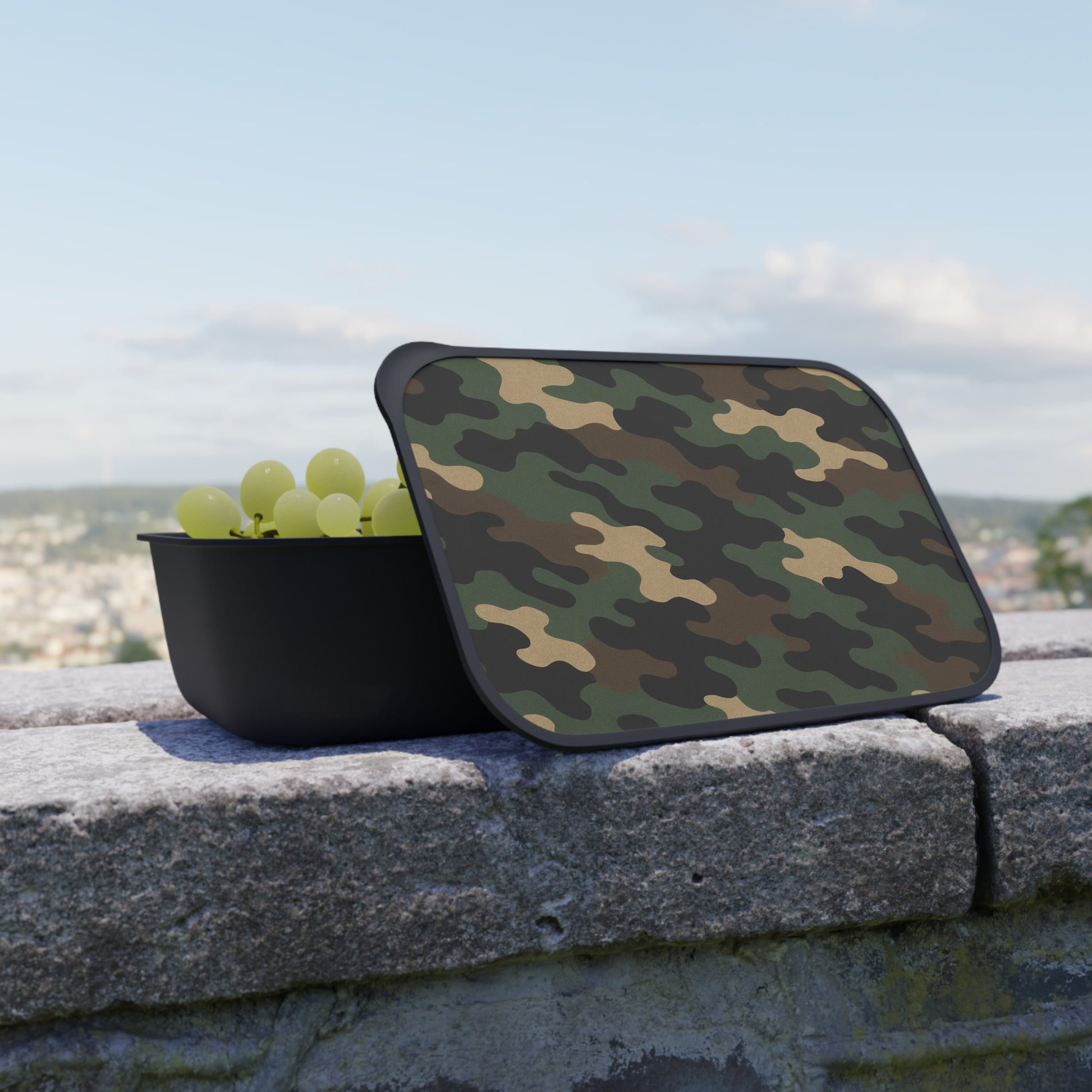 Camouflage PLA bento box with band and utensils, eco-friendly lunch container, accessories from Printify on a white background.