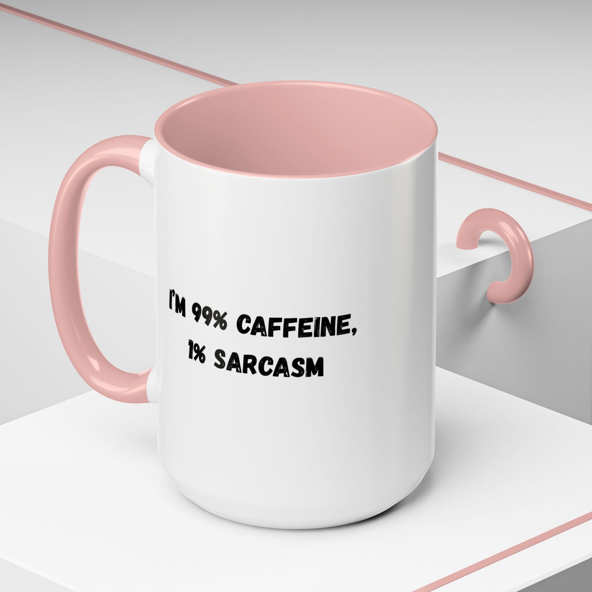 Ceramic coffee mug with "I'm 99% Caffeine, 1% Sarcasm" print, designed by Printify, showing a humorous caffeine-themed design.