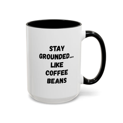 White ceramic coffee mug with "Stay Grounded Like Coffee Beans" printed in black, 11oz size, ideal for coffee lovers.