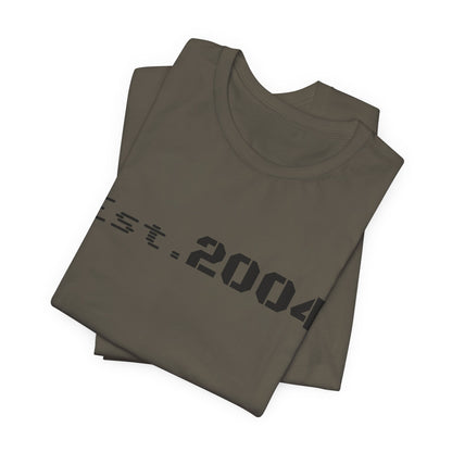 Vintage-style Est. 2004 T-Shirt by Printify featuring minimal design and classic birth year graphic on soft fabric.