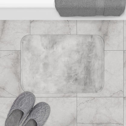 Grey modern minimalist bath rug by Printify, soft textured rug suitable for bathroom decor and housewarming gifts.
