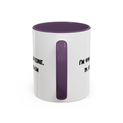 Ceramic coffee mug with "I'm 99% Caffeine, 1% Sarcasm" printed design, ideal for coffee lovers and sarcastic humor enthusiasts.