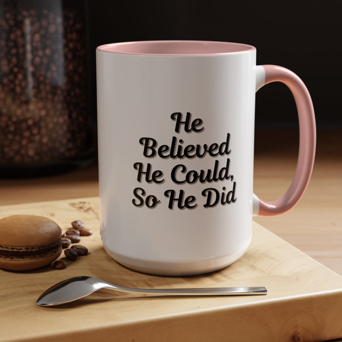 Printify "He Believed He Could So He Did" inspirational coffee mug with bold black text on white ceramic surface.