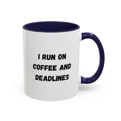 White ceramic coffee mug with "I Run on Coffee and Deadlines" slogan in black text, featuring a handle and printed design.