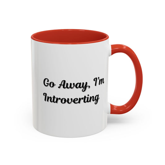Ceramic coffee mug with "Go Away, I'm Introverting" text in black, 11 oz, designed for introverts, by Printify.