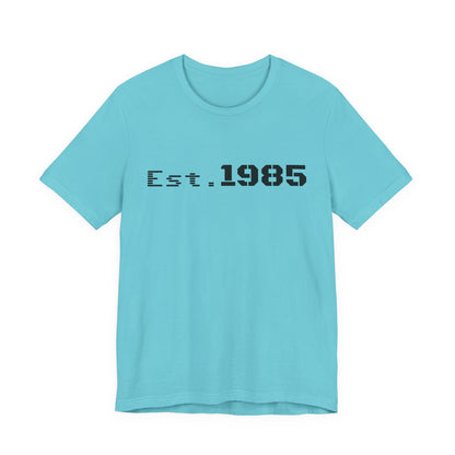 Vintage Est. 1985 graphic T-shirt by Printify featuring a retro design and classic styling.