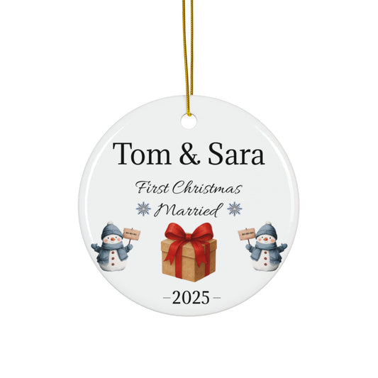 Personalized ceramic ornament featuring "Tom & Sara First Christmas Married 2025" in elegant script, with festive holiday design.