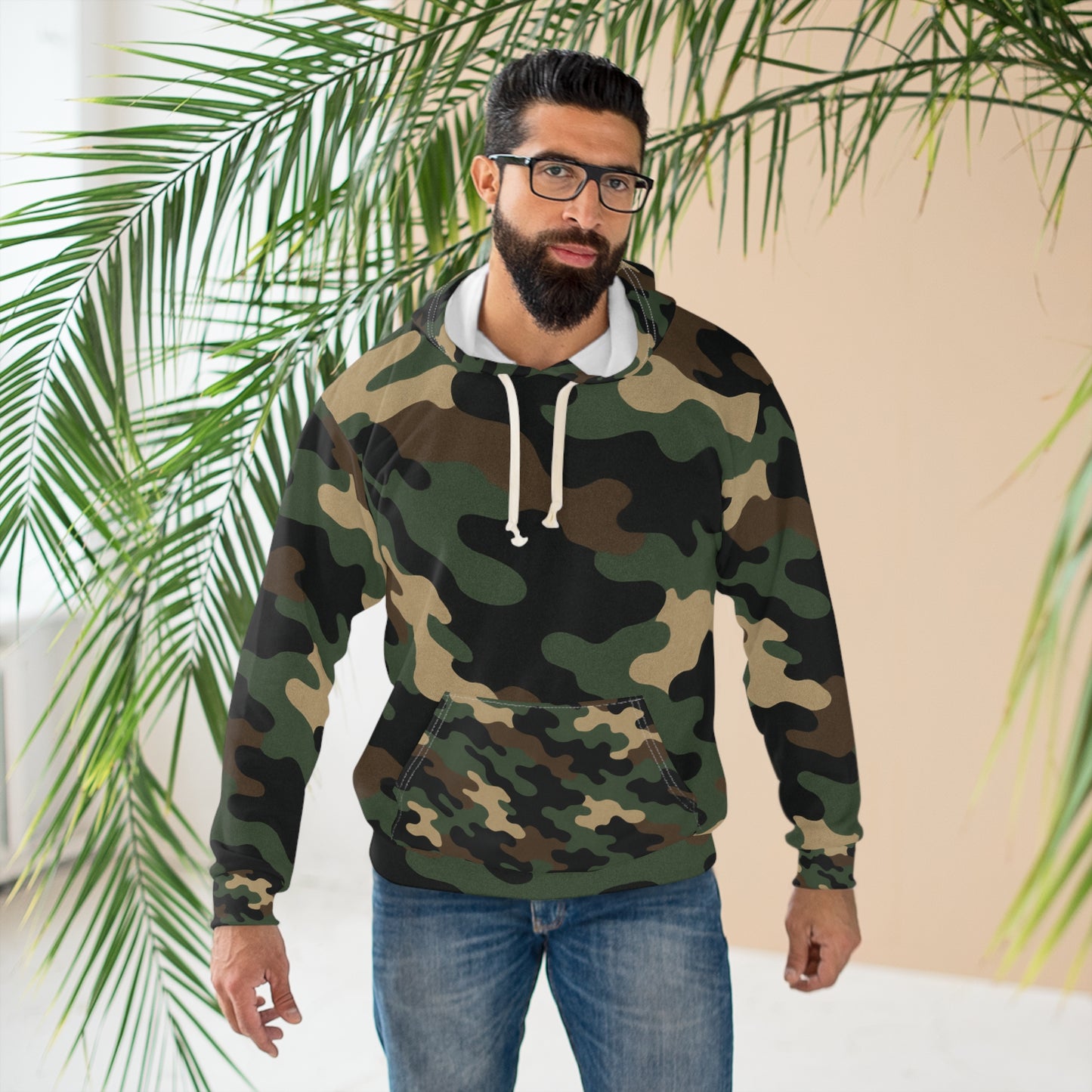 Green woodland camouflage hoodie with all-over print design by Printify, featuring a cozy pullover style.