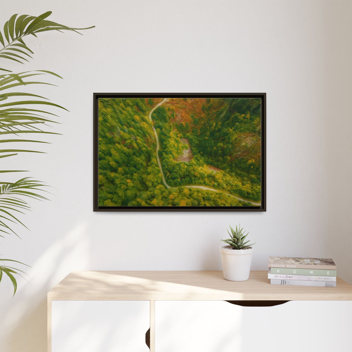 Colorful framed matte canvas wall art featuring an aerial view of a forest path landscape by Printify