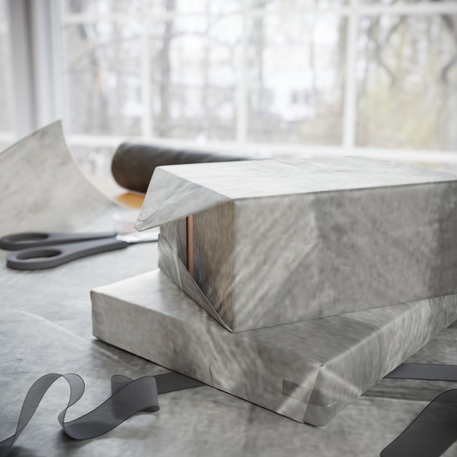Gray marble wrapping paper roll with watercolor design, ideal for weddings, birthdays, and minimalist gift packaging.