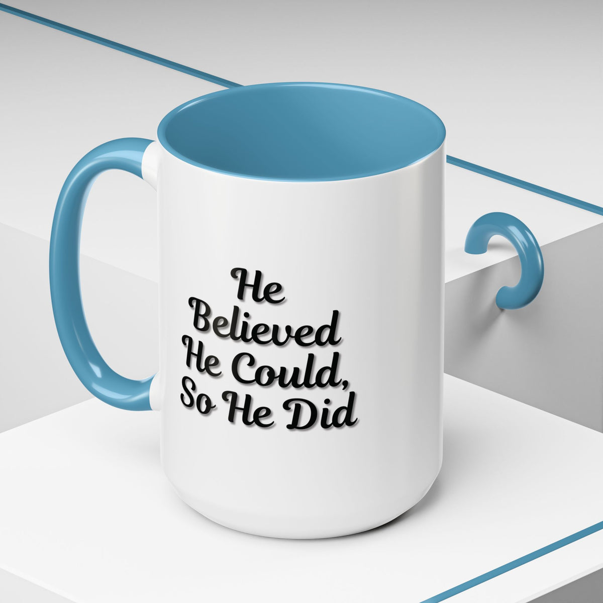 Printify ceramic coffee mug with "He Believed He Could So He Did" inspirational quote, featuring a white mug with black lettering.
