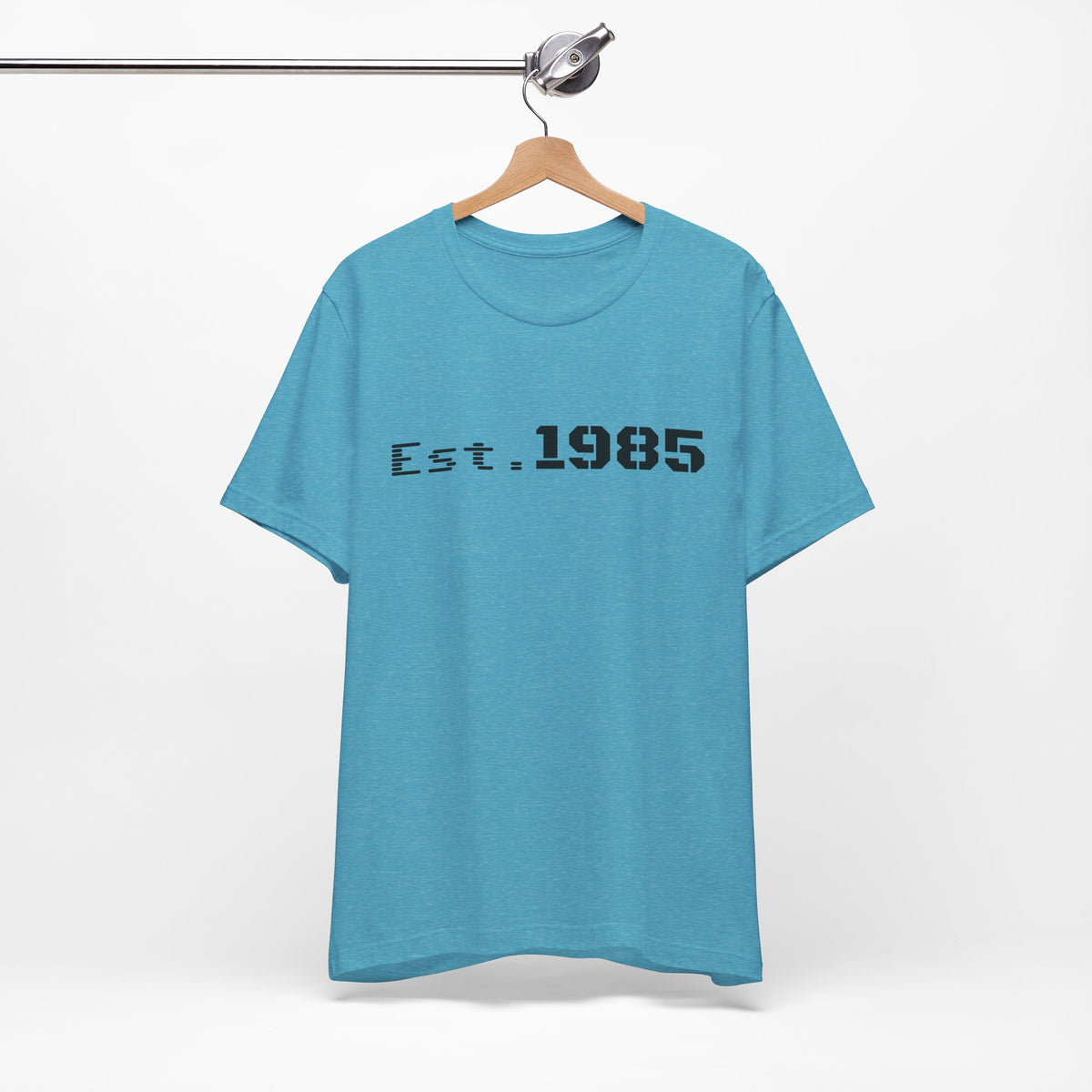 Vintage Est. 1985 graphic T-shirt by Printify featuring a retro year design on soft cotton fabric.