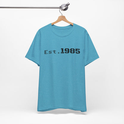 Vintage Est. 1985 graphic T-shirt by Printify featuring a retro year design on soft cotton fabric.