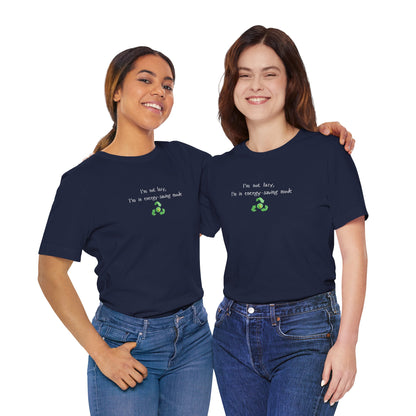 Eco humor T-shirt from Printify featuring the "I’m Not Lazy, I’m an Energy-Saving Mock" slogan on a casual cotton tee.