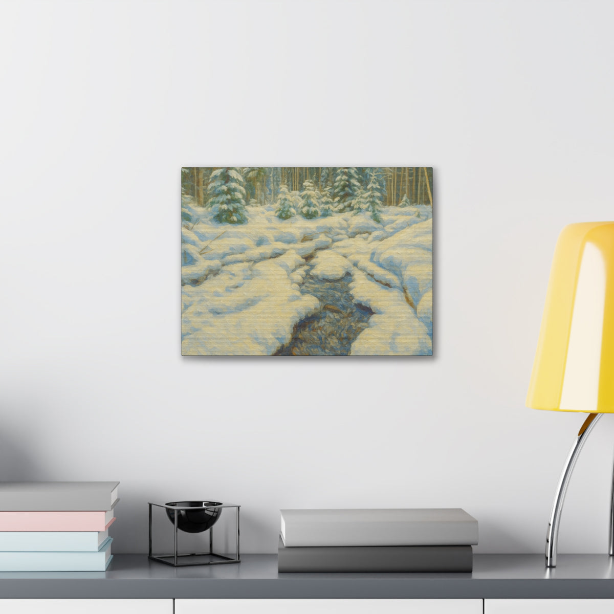 Snowy forest stream winter landscape canvas wall art by Printify, showing a tranquil snowy forest scene with a flowing stream.