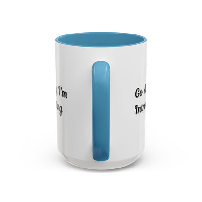 Ceramic coffee mug with "Go Away, I'm Introverting" quote, 11 oz, featuring a white background and black text design.
