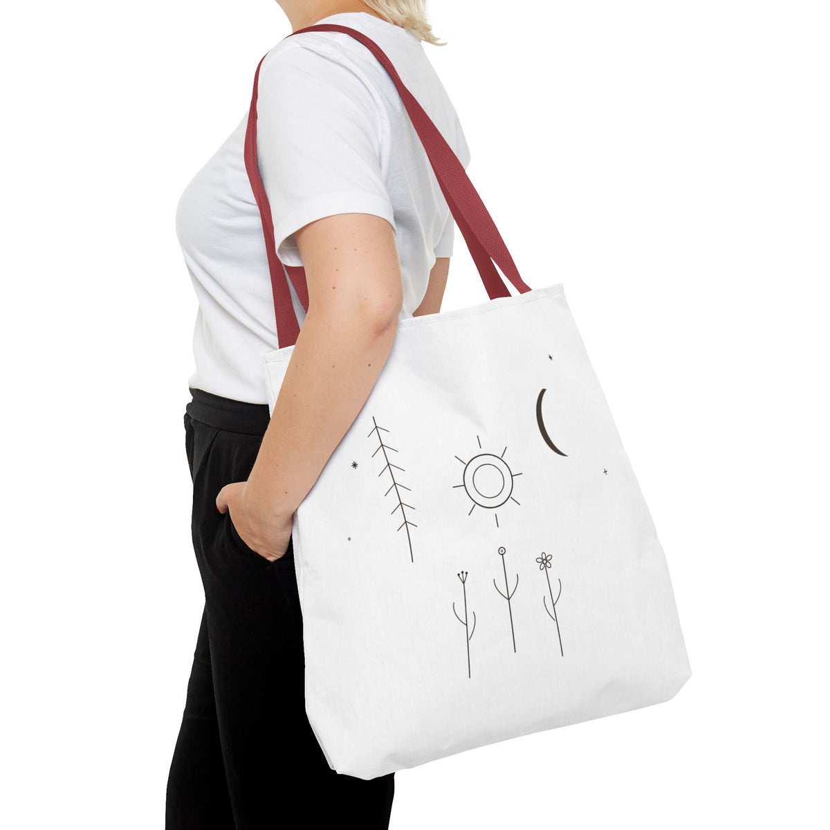 Minimal moon and sun botanical tote bag with celestial line art design, featuring nature-inspired print on durable fabric.