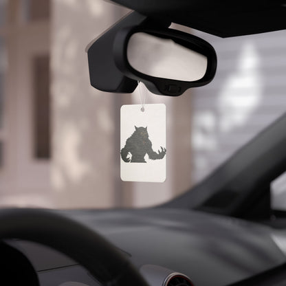 Werewolf-themed car air freshener accessory by Printify, featuring a spooky Halloween design hanging from a car rearview mirror.