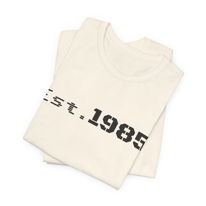 Printify vintage Est. 1985 graphic T-shirt featuring bold year design on a classic cotton tee.