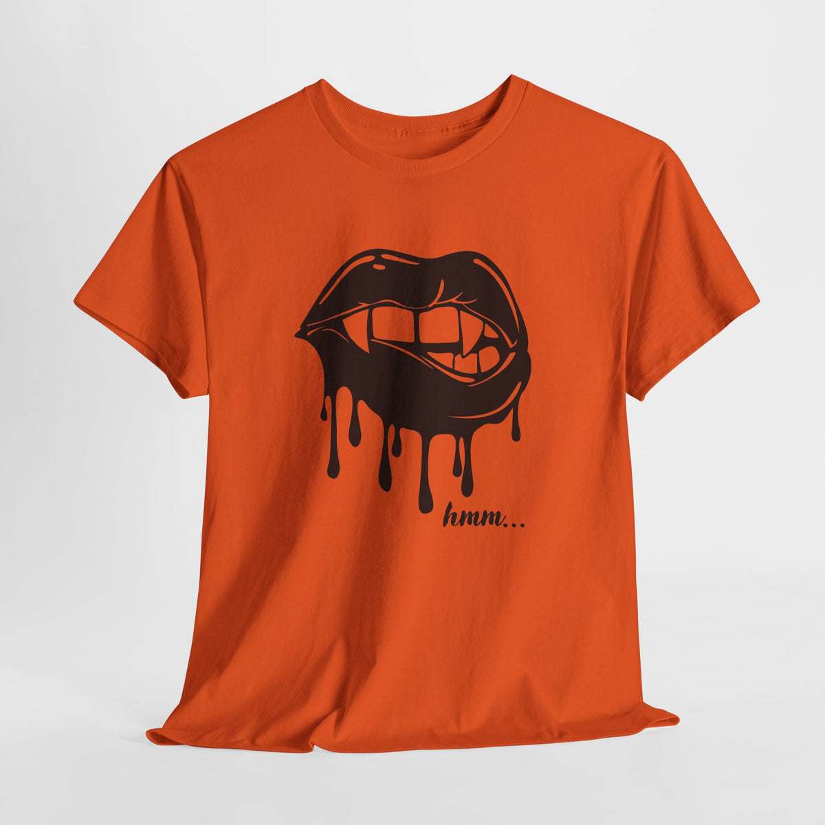 Graphic T-shirt by Printify featuring a dripping lips 'hmm...' bite design on soft fabric, with bold black and red print.