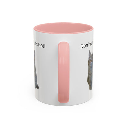 Ceramic cat coffee mug with "Don't rush, it's hot!" text, 11 oz, featuring a playful cat design on a white background.