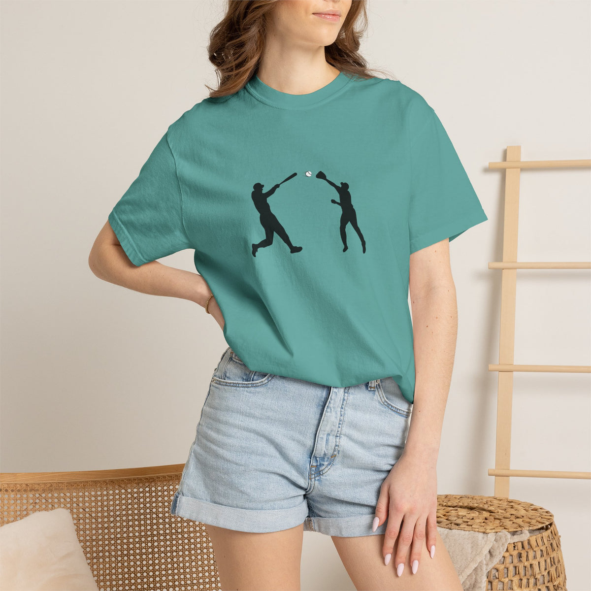 Black baseball silhouette graphic T-shirt for men, featuring minimal baseball player design on a casual crew neck tee.