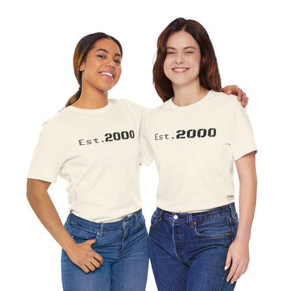 Retro pixel design T-shirt by Printify featuring "Born in 2000" text, celebrating the Est. 2000 vintage style.