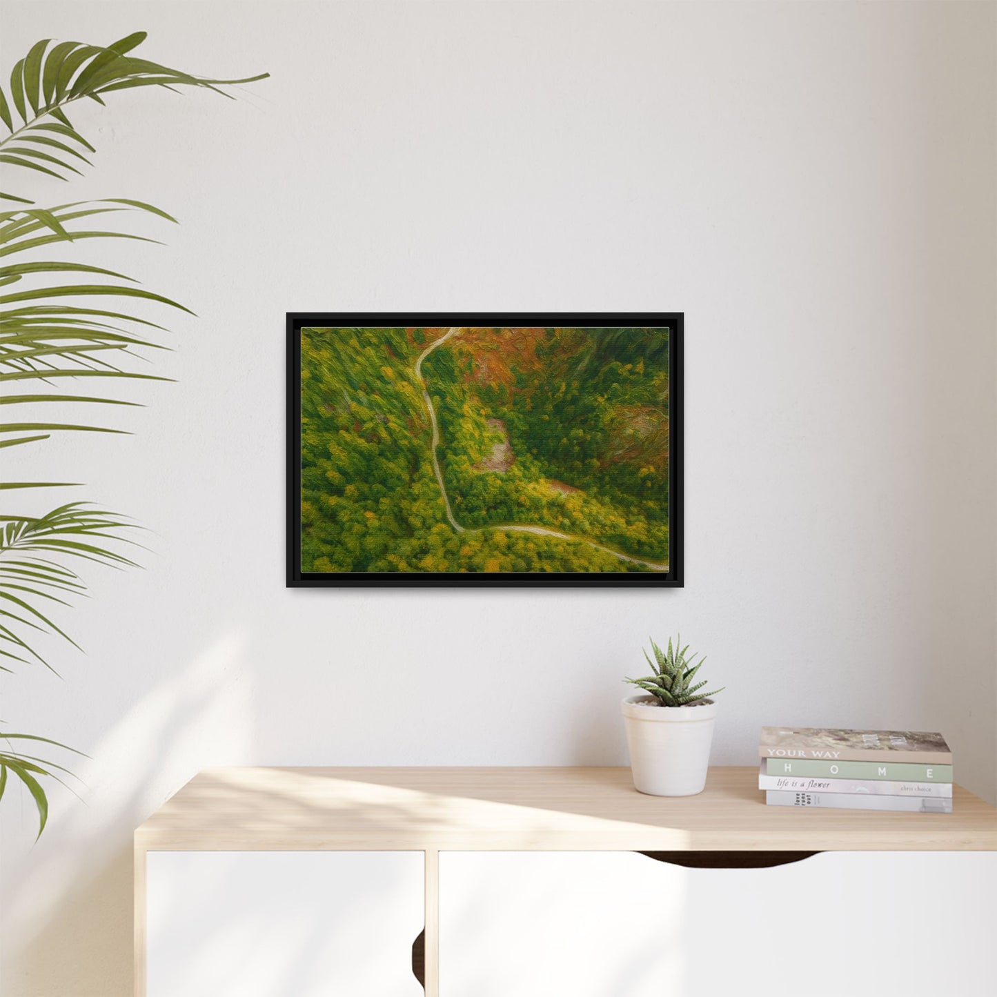 Framed matte canvas wall art featuring a colorful aerial forest path landscape by Printify.