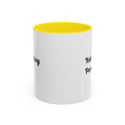 Ceramic mug with "Not a Morning Person" text in black, 11oz size, on a white background, ideal for coffee or tea.